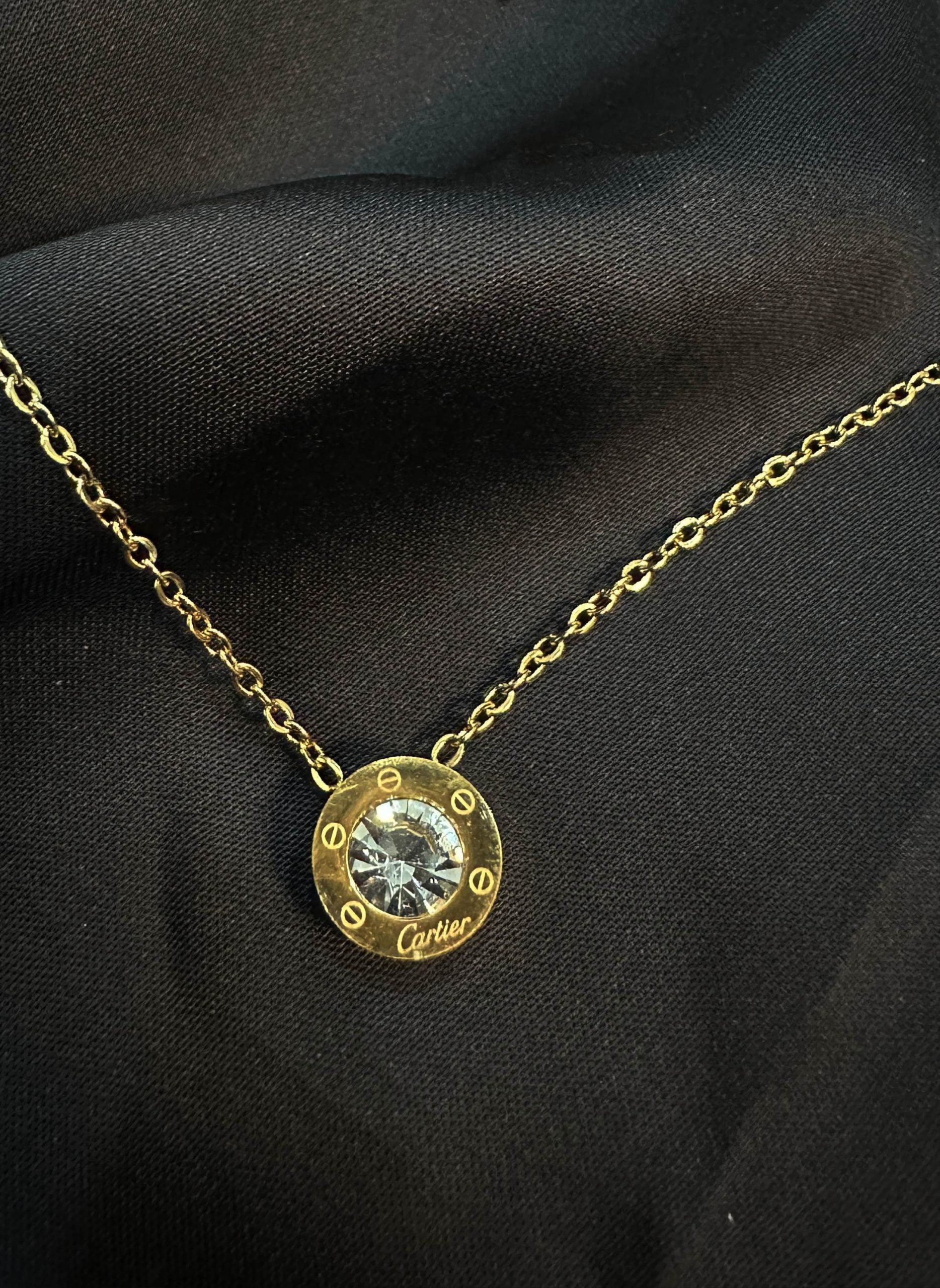 rounded shape pendant with stone